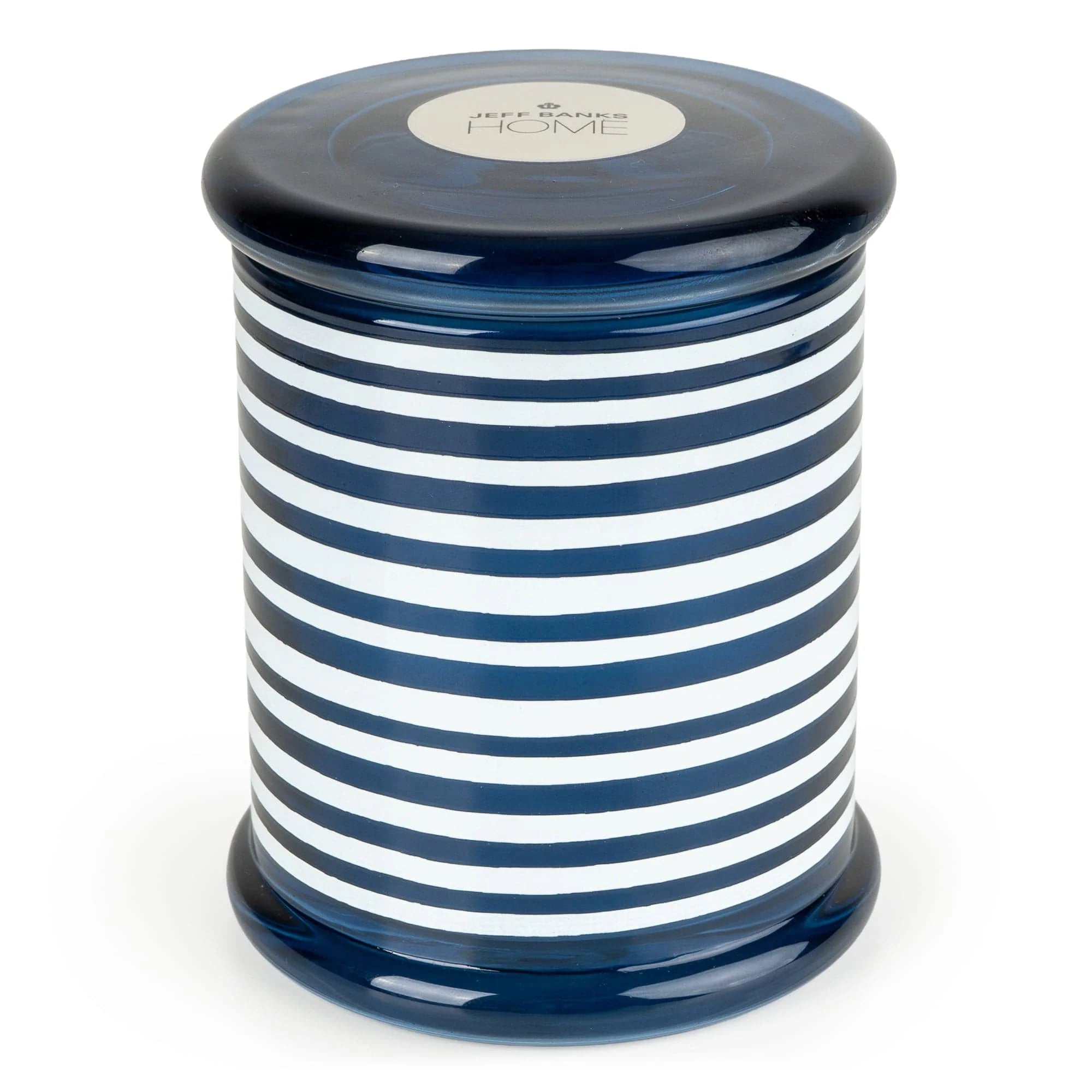 Large blue striped lidded candle jar by Jeff Banks, from Candlelight Products Ltd, displayed with candles in a home decor setting.