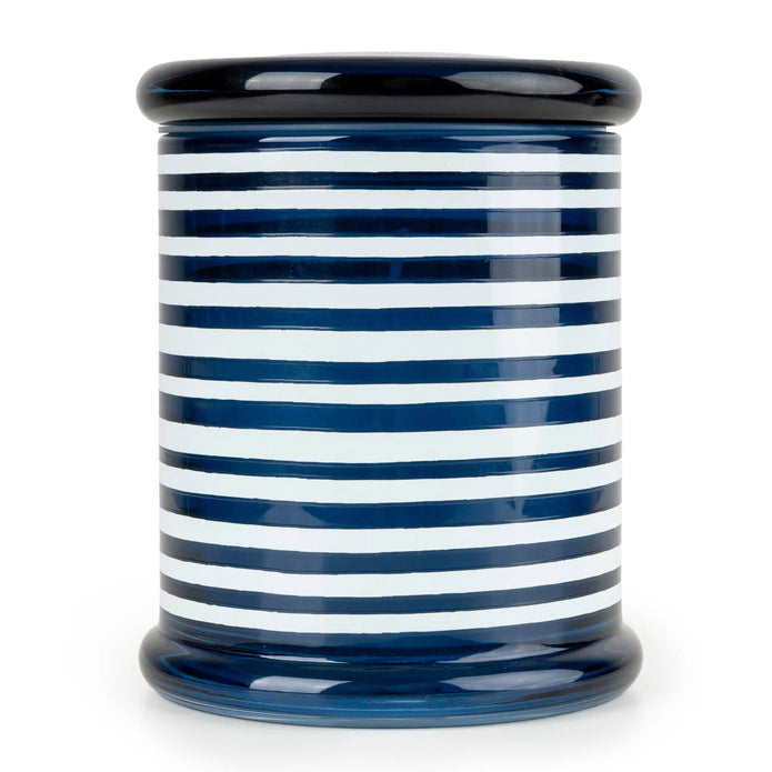 Large blue striped lidded candle jar by Jeff Banks, part of Candlelight Products Ltd, shown in a decorative home setting.