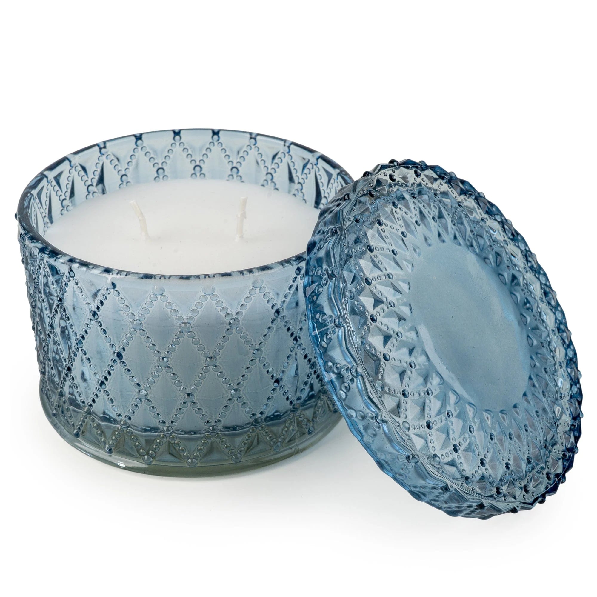 Six blue round embossed candle jars by Candlelight Products Ltd, decorative glass containers for candles.