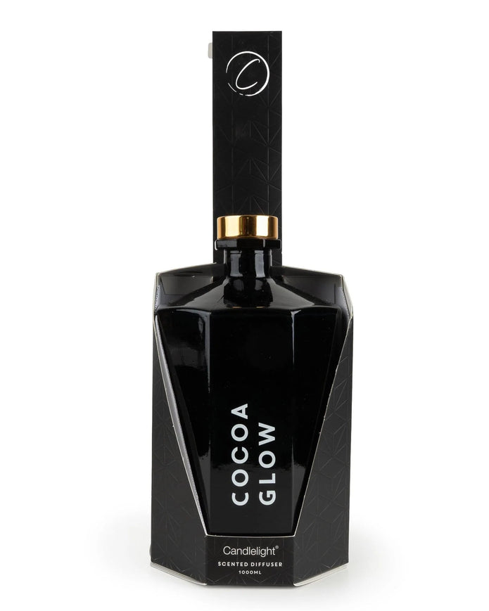 Black diffuser bottle labeled 'Cocoa Glow' on a white background