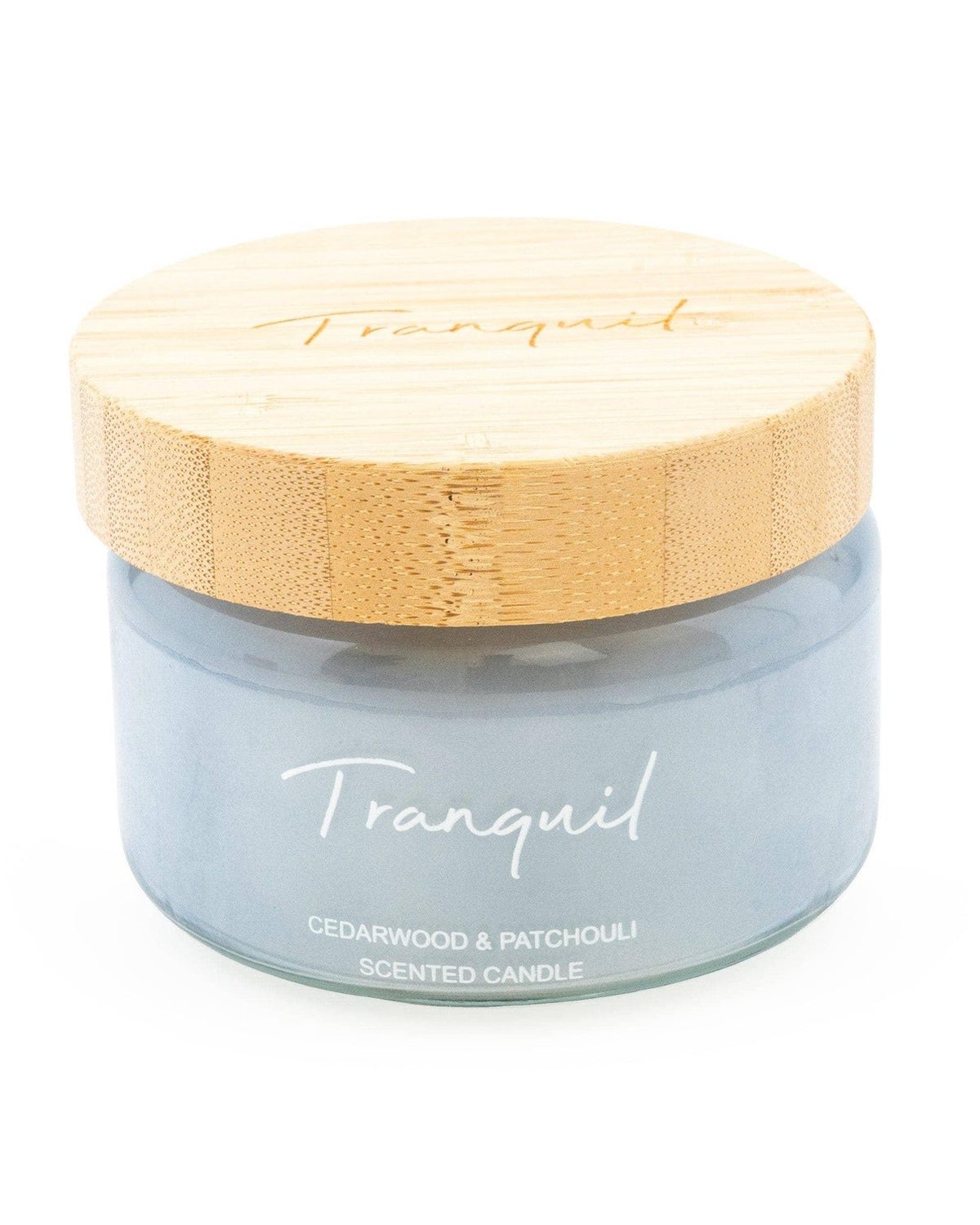 Blue small candle with bamboo lid from Candlelight Products Ltd, featuring Woodsage and Seasalt scent, in a serene candleholder.