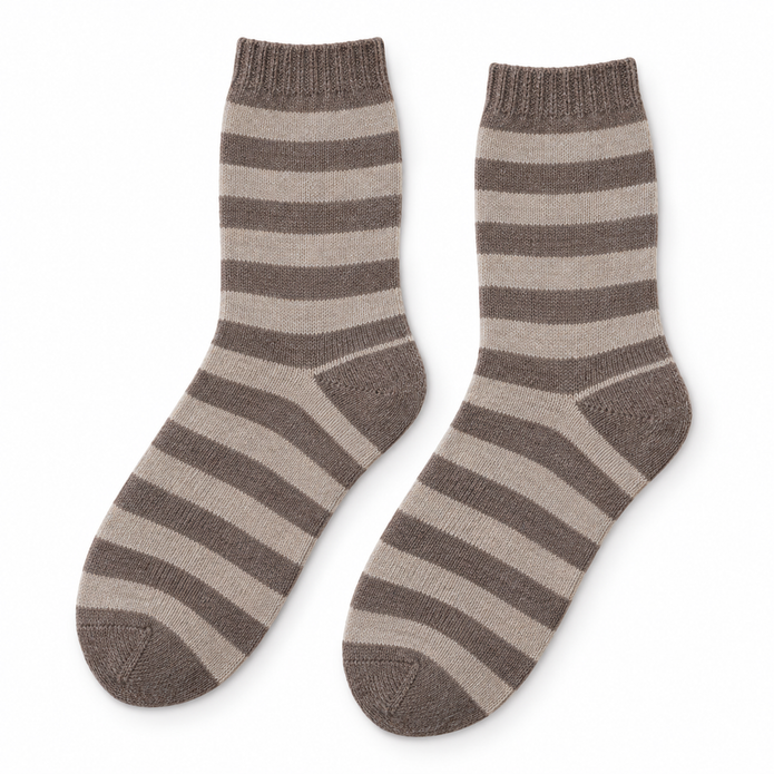 Pair of cappuccino striped wool-blend cosy socks on a white background