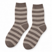 Pair of cappuccino striped wool-blend cosy socks on a white background