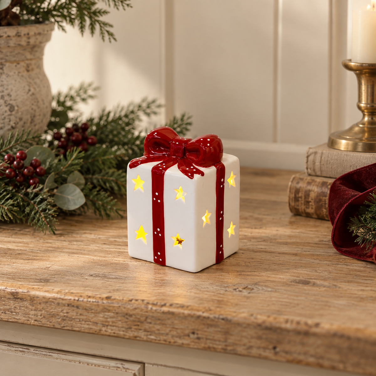 White and Red LED Ceramic Present styled in a warm neutral Christmas interior