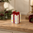 White and Red LED Ceramic Present styled in a warm neutral Christmas interior