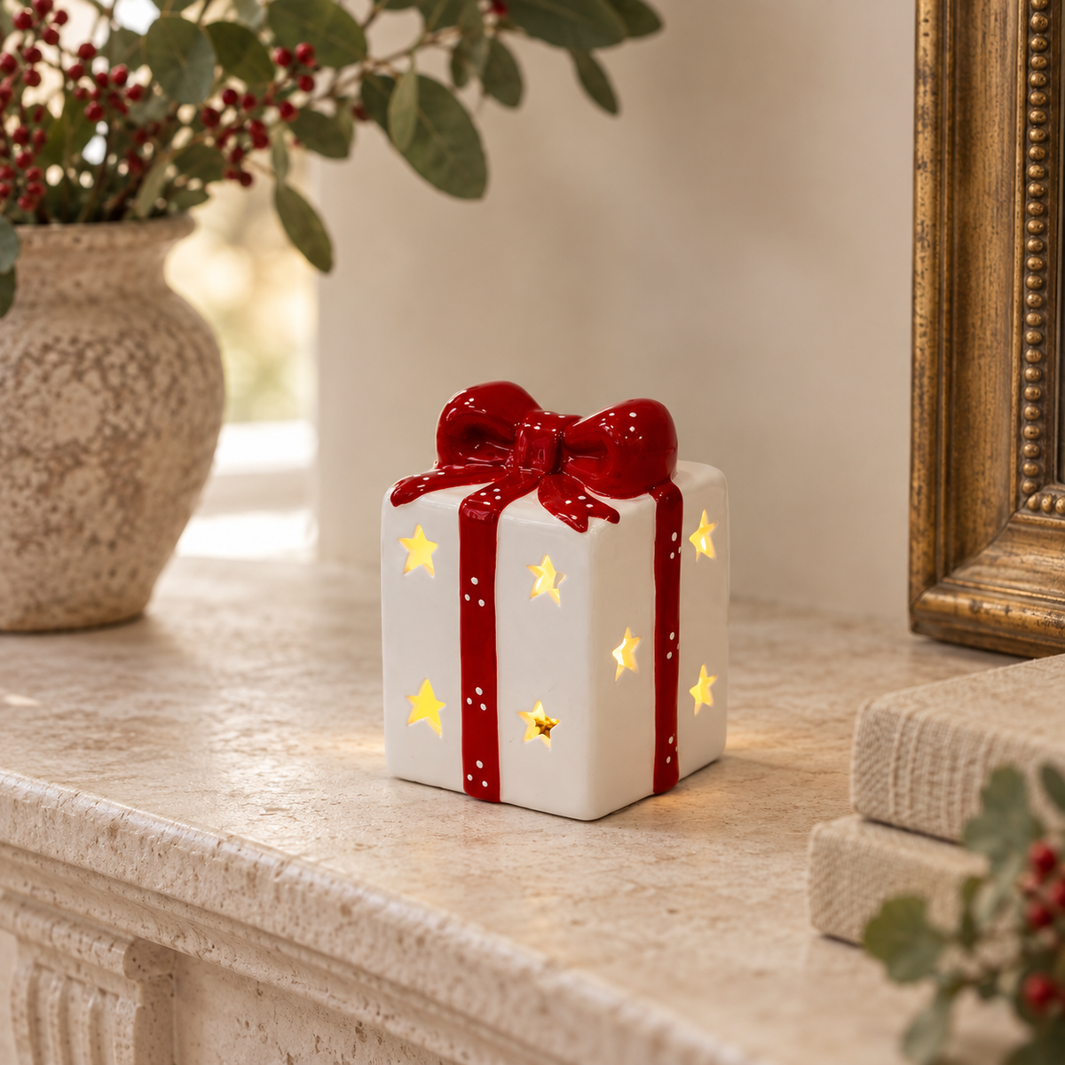 White and Red LED Ceramic Present styled in a warm neutral Christmas interior