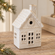 Close-up detail of Large White LED Christmas Decorated House