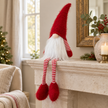 Traditional Red Dangly-Leg Christmas Gonk styled in a warm neutral Christmas interior