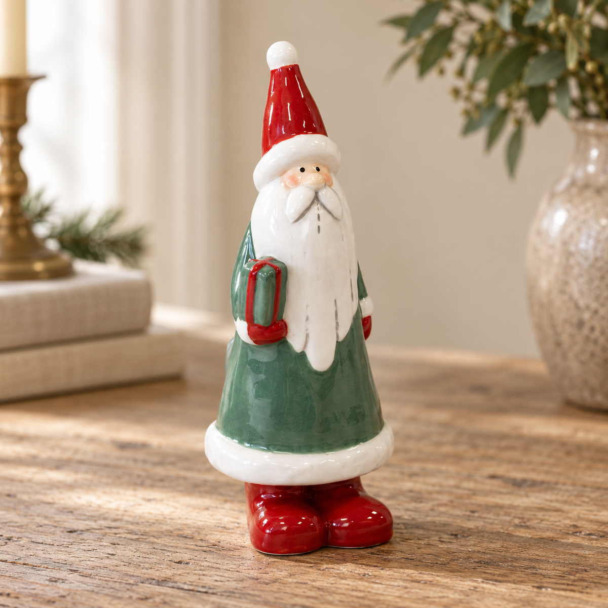 Close-up detail of Large Green Ceramic Santa Holding a Present