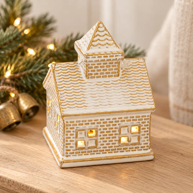 White and gold ceramic LED light up house — oak console