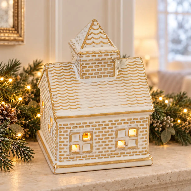 White and gold ceramic LED light up house — stone mantel