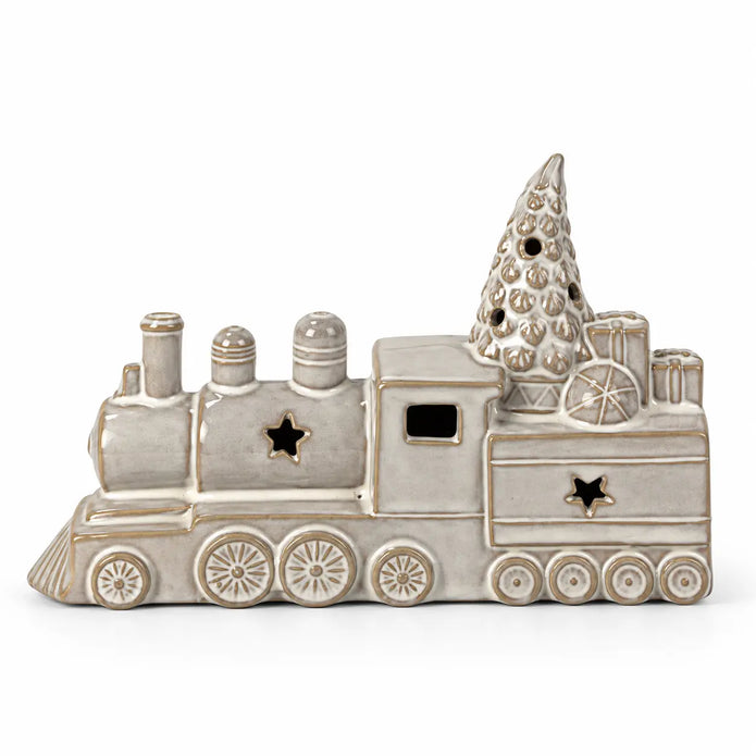 Glazed ceramic Christmas train ornament with tree and gifts on a white background