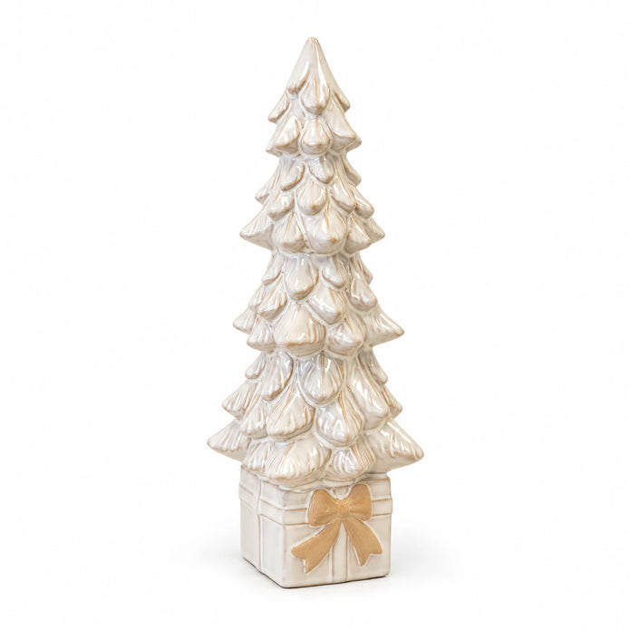 Full white studio view of the large ivory ceramic Christmas tree on its beige-bow gift-box base.