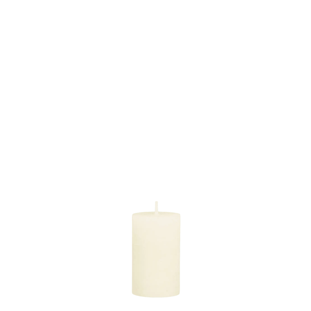 Cream rustic wax pillar candle from Chic Antique, showcasing a textured, handcrafted candle with a natural, rustic finish.
