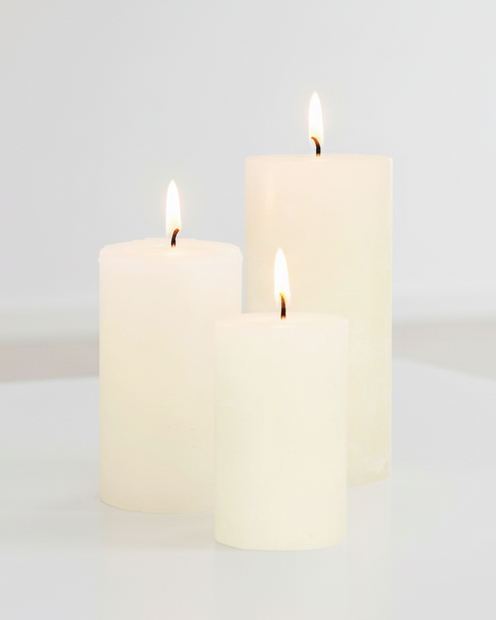 Cream rustic wax pillar candle from Chic Antique, featuring a textured, natural finish perfect for cozy decor.