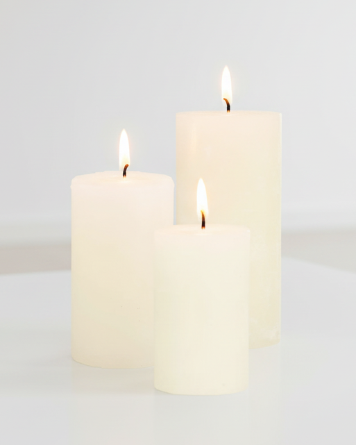 Cream rustic wax pillar candle from Chic Antique, featuring a textured, natural finish perfect for cozy decor.