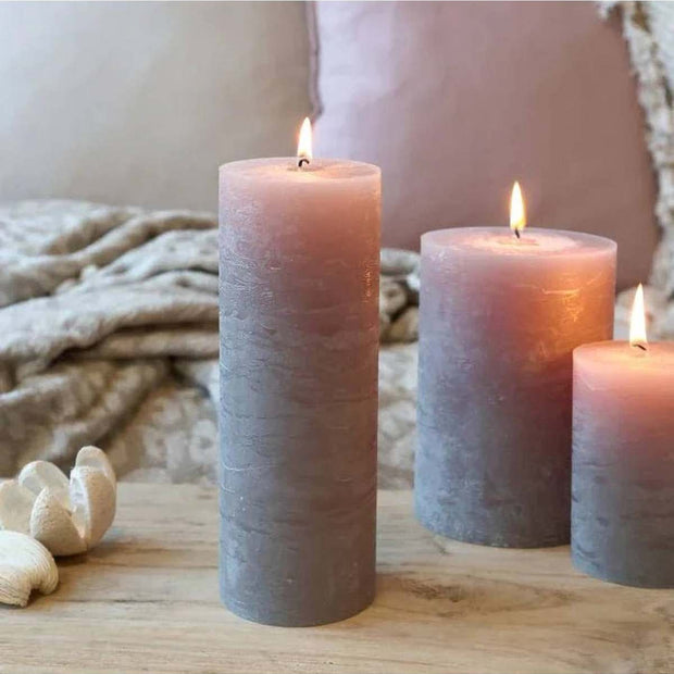 Rustic Rose Pink Pillar Candle by Chic Antique, showing a tall, elegant pink candle with a textured rustic finish.