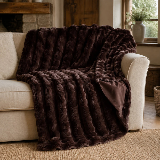 Chocolate Brown Luxury Faux Fur Blanket Throw, chocolate brown faux fur throw draped over a cream sofa