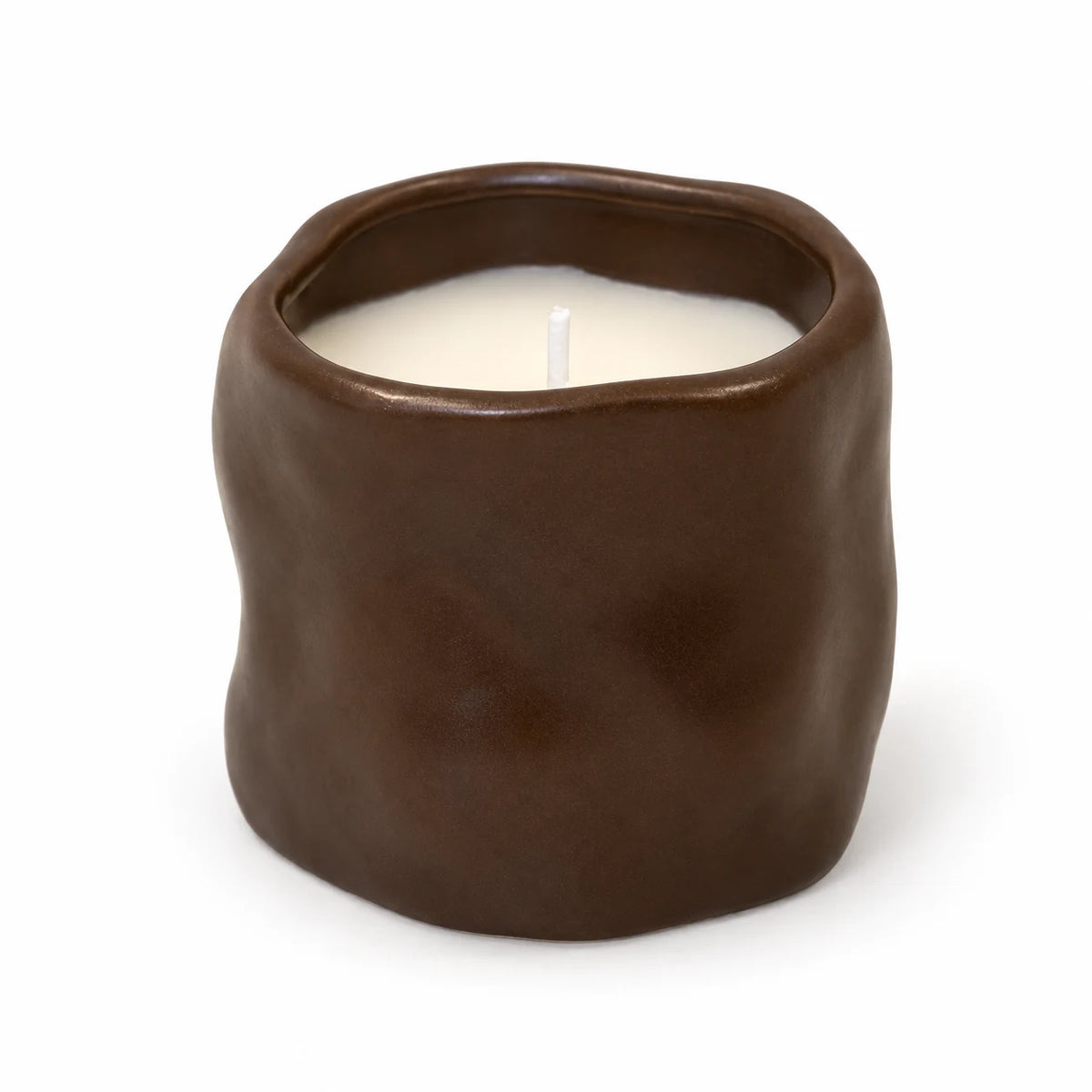 Chocolate Brown Sculpted Candle, complete and unlit on a white background