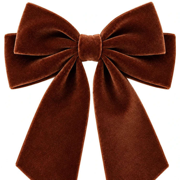 Close-up of layered loops and short tails of the Medium velvet bow
