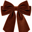 Close-up of layered loops and short tails of the Medium velvet bow