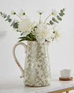 Green and white ceramic flowers jug by Clayre & Eef featuring a decorative floral design and a classic ceramic finish.