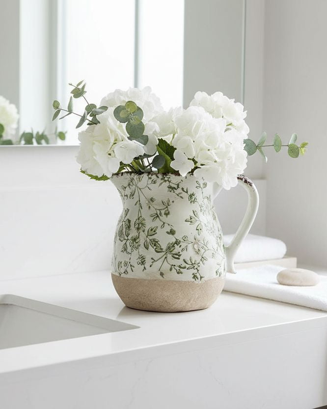Green and white ceramic leaves jug vase by Clayre & Eef, used as elegant home decor with detailed leaf design.