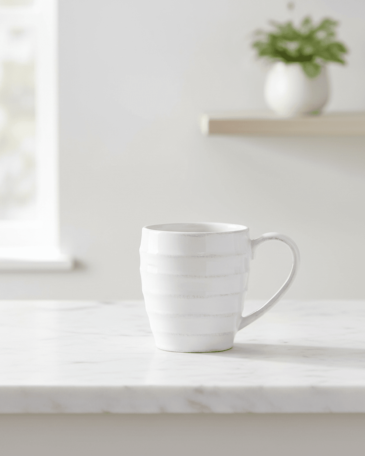 White ceramic ribbed round tea cup mug from Clayre & Eef, perfect for kitchen and dining use.