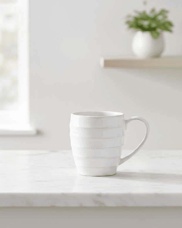 White ceramic ribbed round tea cup mug from Clayre & Eef, perfect for kitchen and dining use.