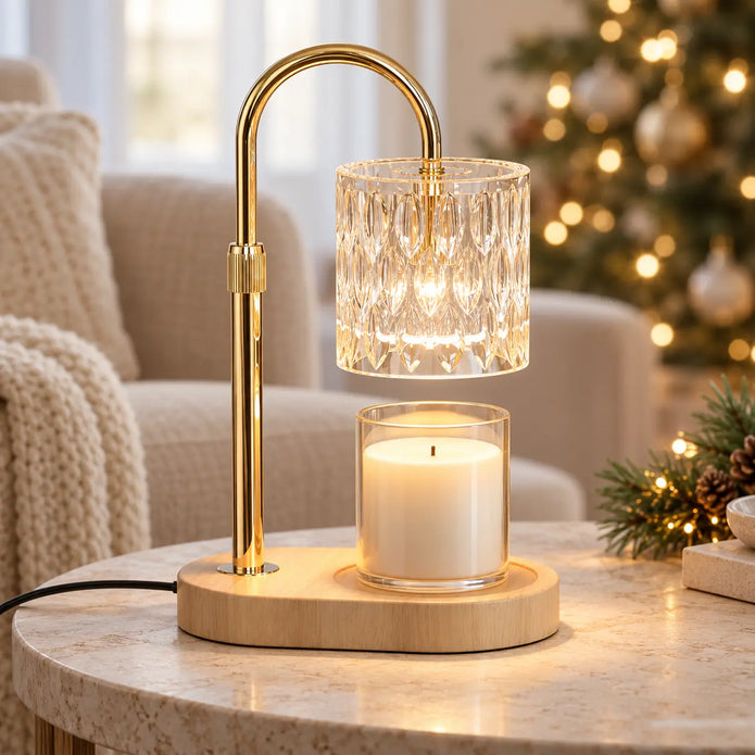 Glass candle warmer illuminating an unlit jar candle beside an oatmeal armchair