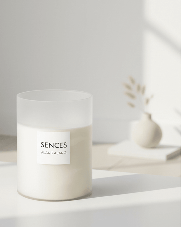 White Alang Alang XXL 7 Wick Candle by Coach House featuring Tonka and Clove scent, with a tall, elegant design and multiple wicks.