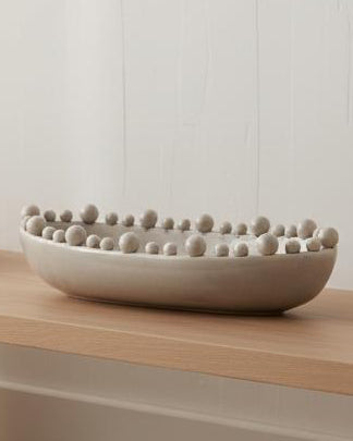 Oval beige Coach House home decor bowl with bobble-edged design, extra large size, suitable for stylish table or shelf display.