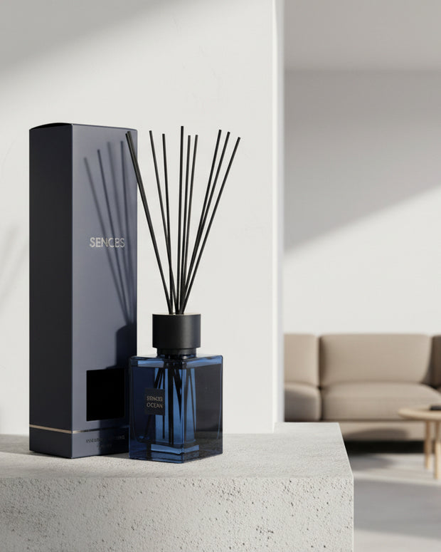 Navy blue Ocean large reed diffuser from Coach House, a coastal home fragrance with elegant glass bottle and reeds.