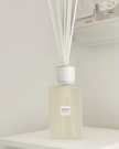 Large Coach House Sences Reed Diffuser in white Alang Alang, a stylish home fragrance with a sleek design and elegant appearance.