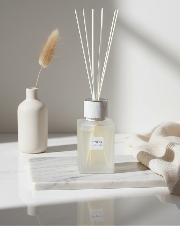 White Alang Alang large reed diffuser by Coach House, 500ml home fragrance with tonka and clove scent, displayed in a clear container.