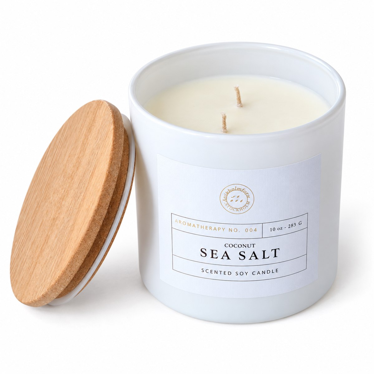 Coconut and Sea Salt candle, unlit white jar with two wicks and wooden lid on white.