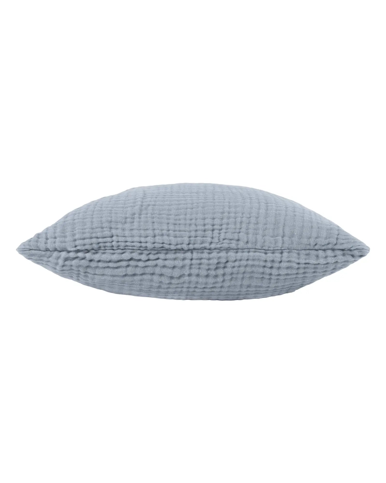Ocean blue muslin cotton cushion cover by Riva Home, soft furnishings with a smooth fabric texture and stylish design.