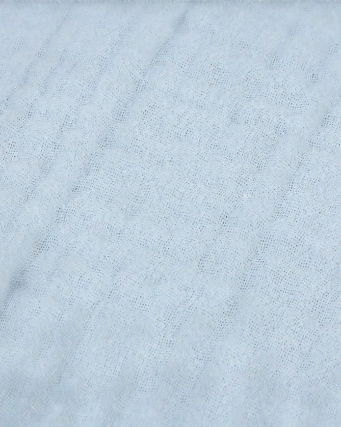 Ocean blue muslin cotton cushion cover from Riva Home, soft furnishings with a smooth, breathable fabric and stylish design.
