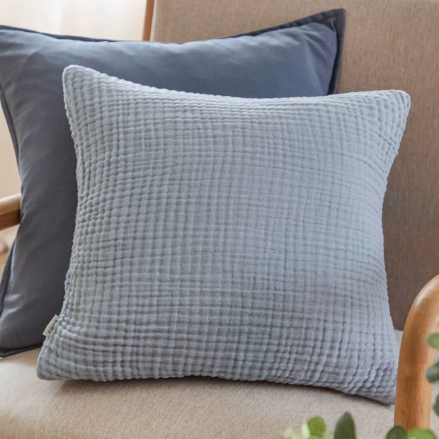 Ocean blue muslin cotton cushion cover by Riva Home, soft furnishings with a smooth, lightweight fabric design.