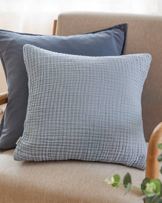 Ocean blue muslin cotton cushion cover by Riva Home, soft furnishings with a smooth, lightweight fabric design.