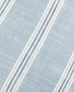 Ocean blue and white striped cotton cushion cover by Riva Home, featuring a soft, stylish design for home decor.