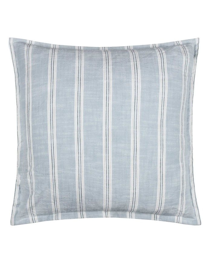 Ocean blue Abersoch Stripe cotton cushion cover by Riva Home, showing soft woven fabric with bold stripe pattern and hidden zipper.