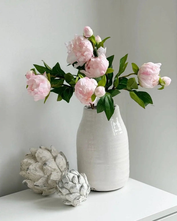 Artificial pale pink double peony flower stem from Starlight Express, showcasing lush, realistic blooms on a slender stem.