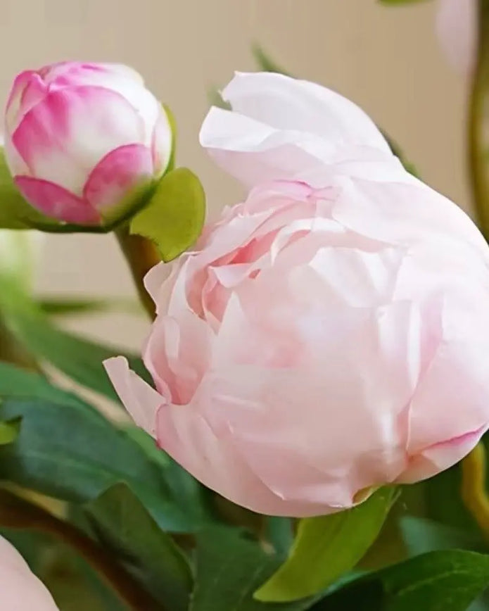 Artificial pale pink double peony flower stem from Starlight Express, showcasing lush, full blooms on a realistic plant stem.