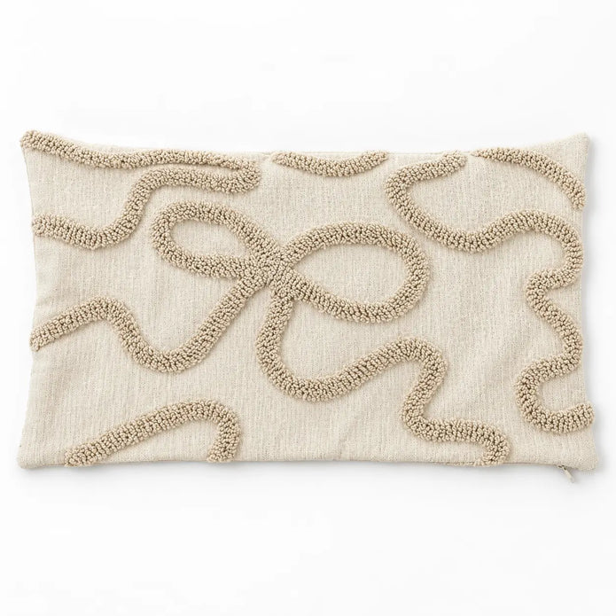 Cream and beige 50cm x 30cm bow rectangle bouclé cushion cover laid flat on a clean white studio background.