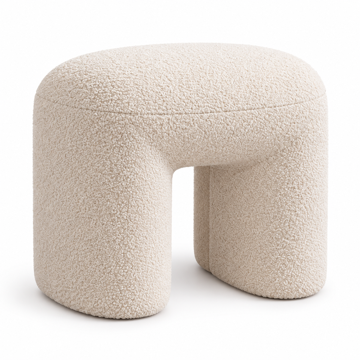 Cream boucle arched footstool on a clean white background