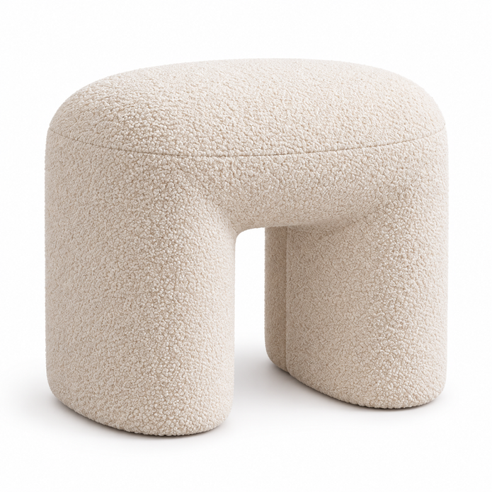 Cream boucle arched footstool on a clean white background