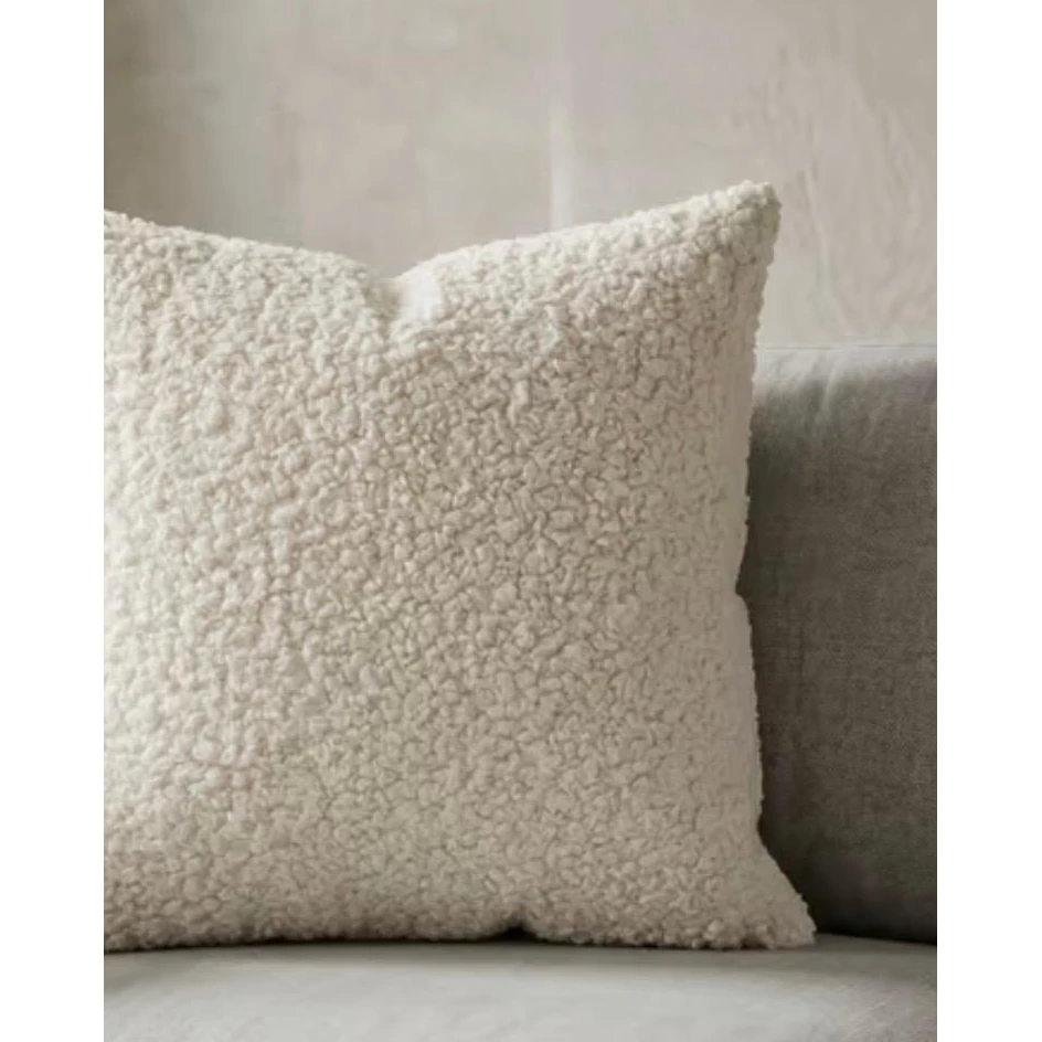 Cream boucle cushion cover from Starlight Express, soft furnishings with textured fabric and cozy appearance.