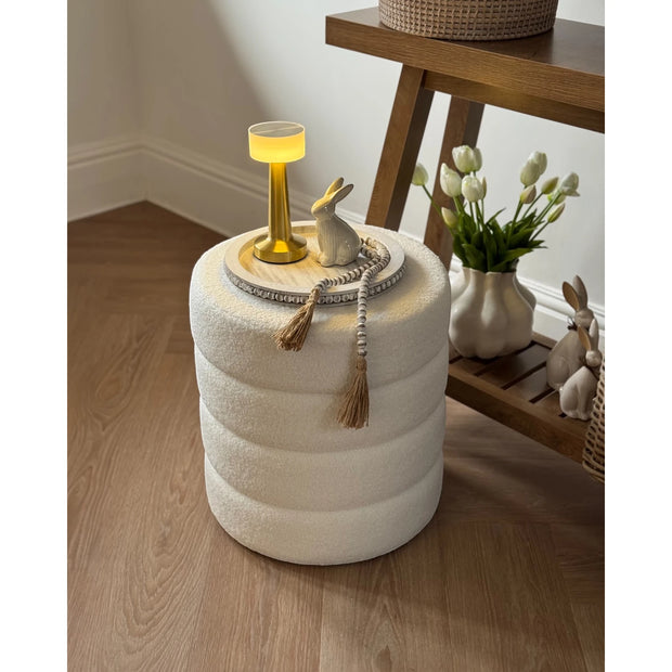 Cream boucle ribbed round foot stool from Starlight Express, featuring plush fabric and a modern, comfortable design.
