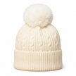 Cream cable knit bobble hat with faux-fur pom pom on white